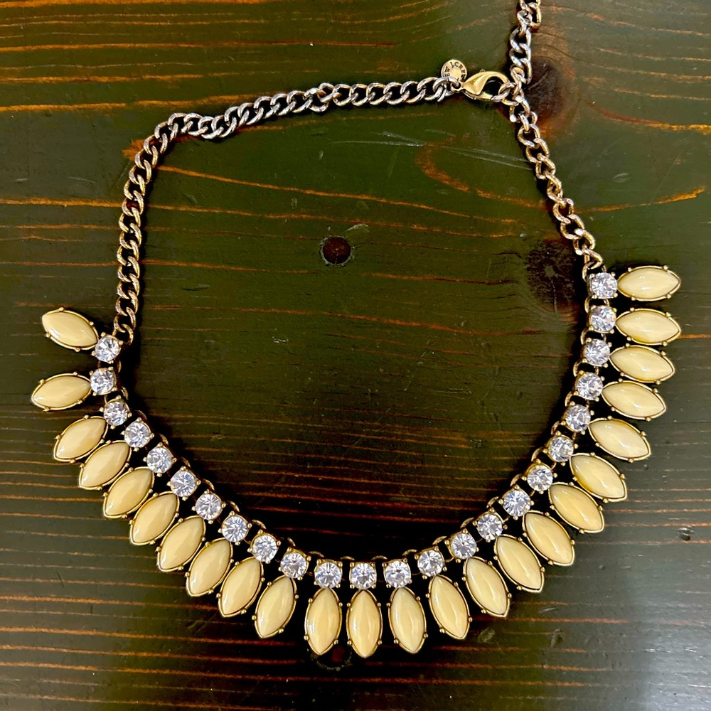 Beautiful gold, white, gem necklace.